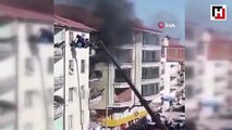 Apartmanda çıkan yangında 60 kişiyi iş makinesiyle kurtardı