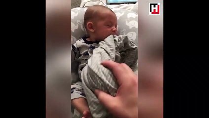 Ağlayan bebeğin imdadına annesinin gömleği yetişti!