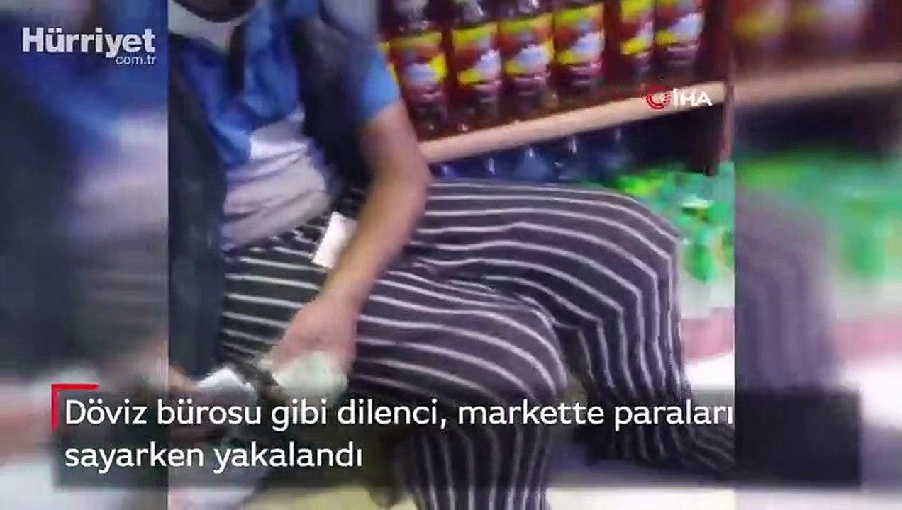 Döviz bürosu gibi dilenci, markette paraları sayarken yakalandı