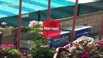 Görüntüleri yürek burkmuştu...  Havuzdaki çocukları izleyen çocuk, kardeşleriyle havuza götürüldü