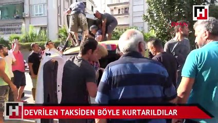 Devrilen taksiden böyle kurtarıldılar