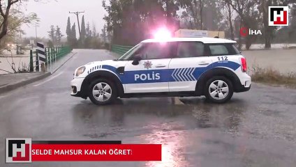 Selde mahsur kalan öğretmenin yardımına polis ekipleri yetişti
