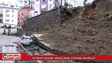 İstinat duvarı araçların üzerine devrildi