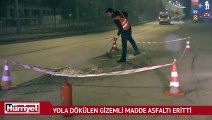 Yola dökülen gizemli madde asfaltı eritti