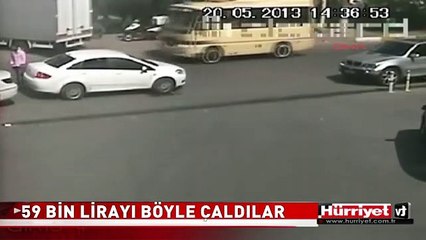 OTOMOBİLİN CAMINI KIRIP 59 BİN LİRA ALDILAR