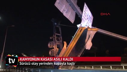 Kamyonun kasası asılı kaldı, sürücü olay yerinden kupayla kaçtı