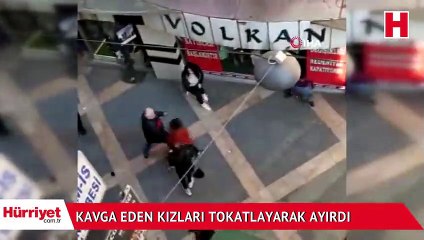 Kavga eden kızları tokatlayarak ayırdı