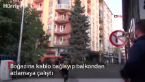 Boğazına kablo bağlayıp balkondan atlamaya çalıştı