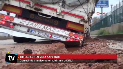 Bursa'da TIR'lar çöken yola böyle saplandı