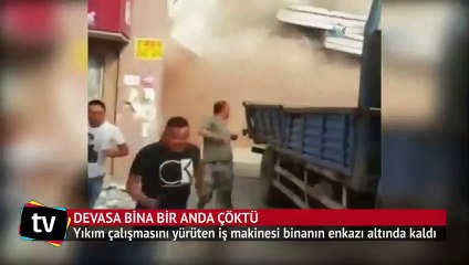 Çin'de devasa bina böyle yıkıldı