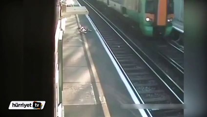 Bir anda kendini tren yoluna attı
