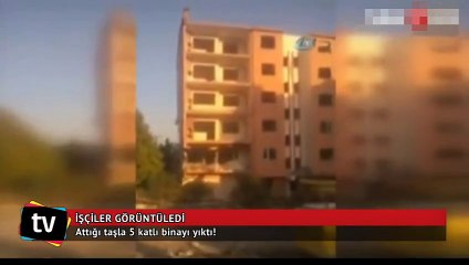 Attığı taşla 5 katlı binayı yıktı!