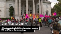 Climate activists hold bicycle protest against IMF and World Bank meetings
