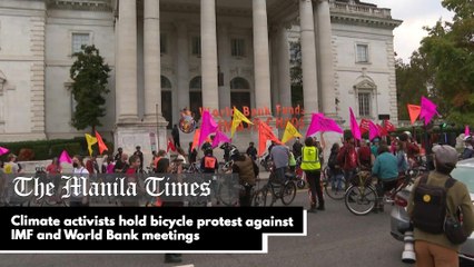 Climate activists hold bicycle protest against IMF and World Bank meetings