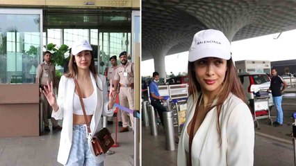 Malaika Arora White Jacket और Cap में पहुंची Airport, खूबसूरत Malaika ने दिए Pose, देखें Video