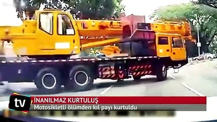 Singapur'da motosikletlinin inanılmaz kurtuluşu