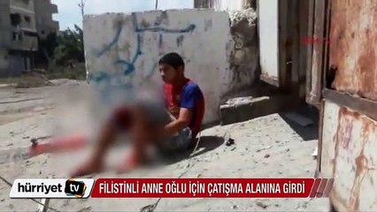Filistinli anne vurulan çocuğu için çatışma alanına girdi