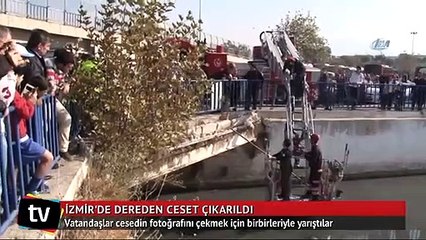 Dereden çıkarılan cesedin fotoğrafını çekmek için yarıştılar