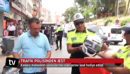 Kasksız sürücülere ceza yerine hediye