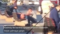 Bankta uyuyan adamın cüzdanını böyle çalmaya çalıştı