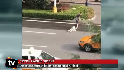 Tartıştığı kadını otoyolda saçlarından sürükledi