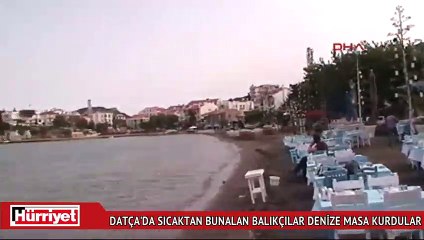 Sıcaktan bunalan balıkçılar denize masa kurdular