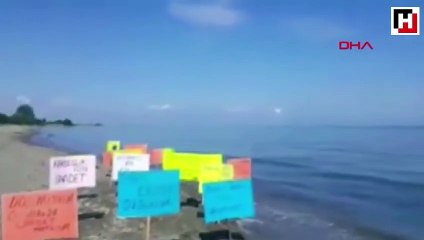 Ordu Milletvekili Adayı takım elbise ile denize girip, oy istedi