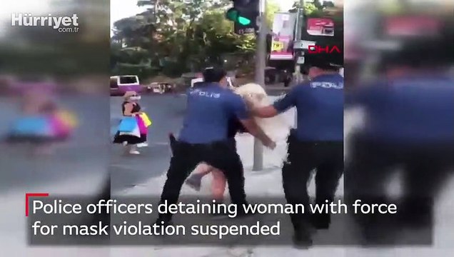 Police officers detaining woman with force for mask violation suspended
