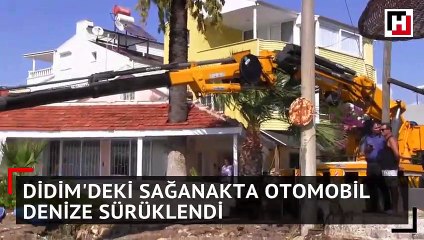 Didim'deki sağanakta otomobil denize sürüklendi