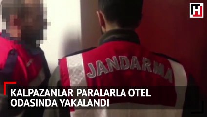Kalpazanlar paralarla otel odasında yakalandı