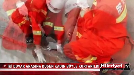 İKİ DUVAR ARASINA DÜŞEN KADIN BÖYLE KURTARILDI
