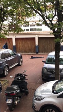 Skateboarder rides in driveway then skateboard accidentally hits boy on his face