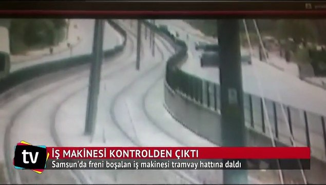 Freni boşalan iş makinesi tramvay hattına daldı