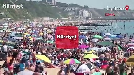 İngiltere'de güneşi gören plajlara akın ediyor