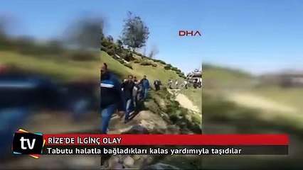 Tabutu halatla bağladıkları kalas yardımıyla taşıdılar