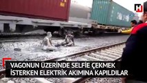 Vagonun üzerinde selfie çekmek isterken elektrik akımına kapıldılar