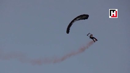 Turkish rockstar lands on stage with parachute for concert