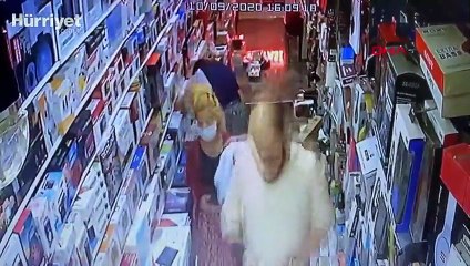 Elektronik malzemeleri eteklerine gizleyerek çaldılar  o anlar kamerada