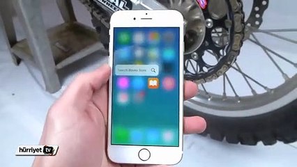 iPhone 6s'i bu sefer motosiklet zincirine sıkıştırdı