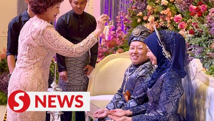 Chinese couple in JB celebrate their union with Malay tradition