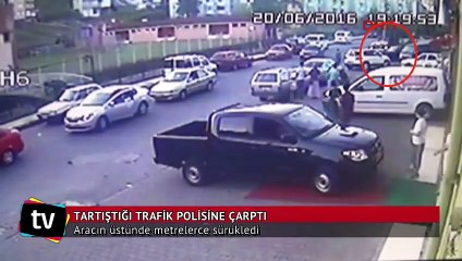 Tartıştığı trafik polisine çarpıp, aracın üstünde sürükledi