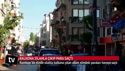 Silahla balkona çıkıp para saçtı