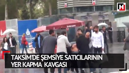 Taksim'de şemsiye satıcılarının meydan kavgası kamerada
