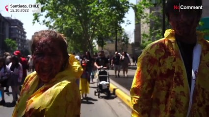 Zombie enthusiasts drag their feet across Santiago