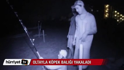 Genç kız oltayla köpek balığı avladı