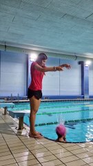 Girl Puts a Swimming Cap on in a Quirky Way