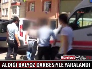 BAŞINA ALDIĞI BALYOZ DARBESİYLE YARALANDI