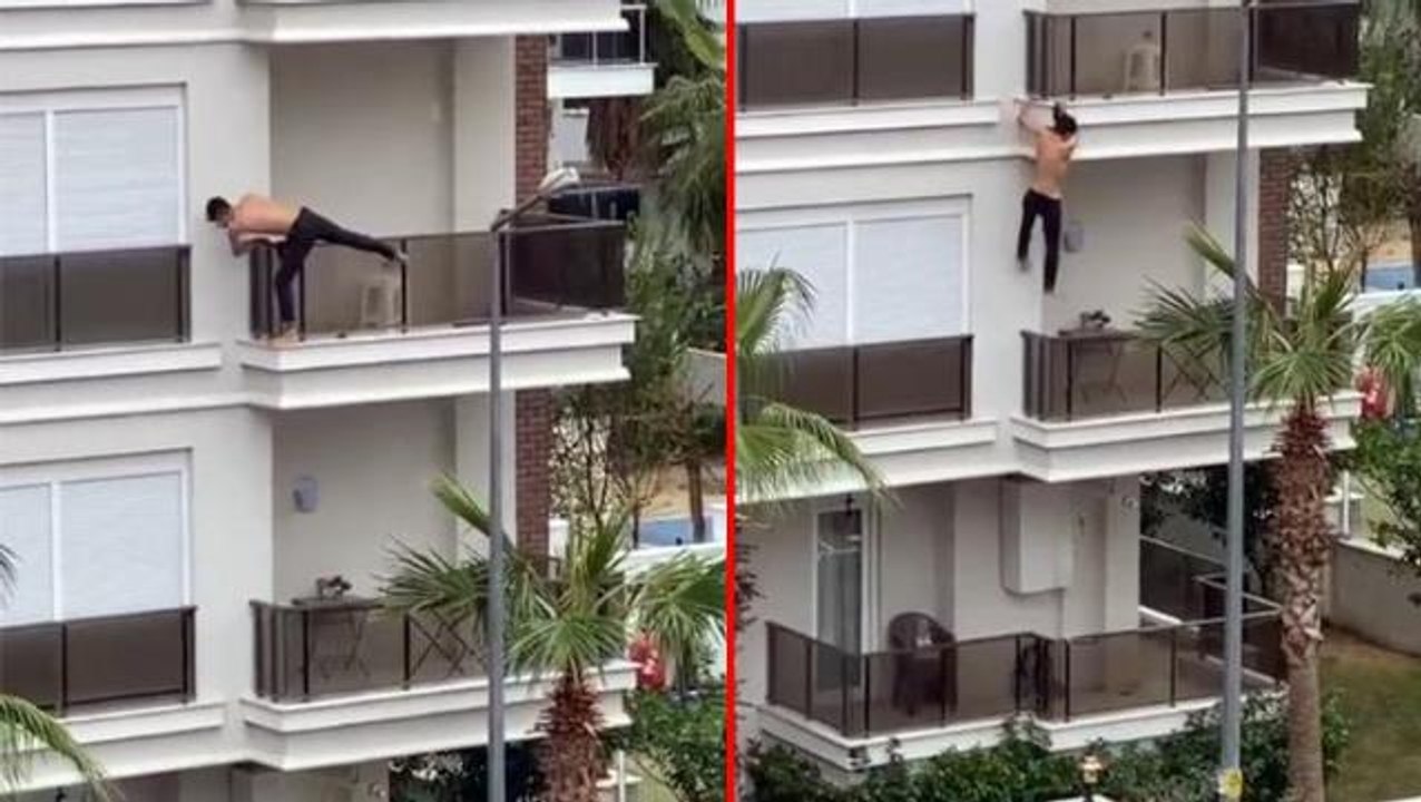 Yürekler ağza geldi! Psikolojik sorunlar yaşayan genç, balkondan balkona böyle sarktı