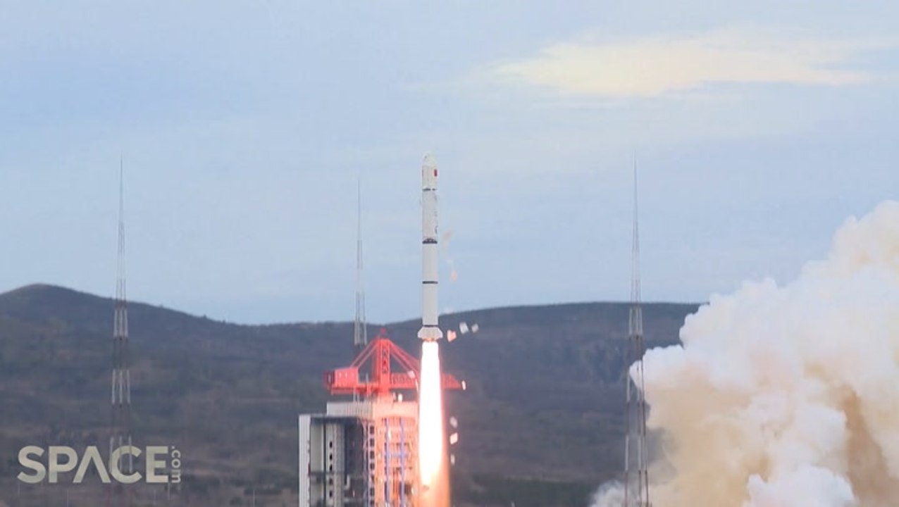 China launches new environmental monitoring satellites, rocket sheds tiles