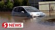 Australians assess flood damage, brace for more rain